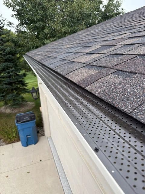 Clean gutters with leaf guards on a Fort Wayne home before winter